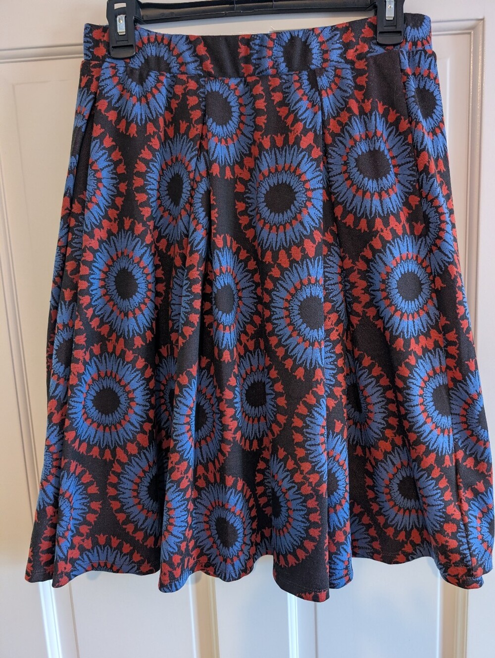 Women's LuLaRoe Black Skirt with Blue and Red Sunburst Print